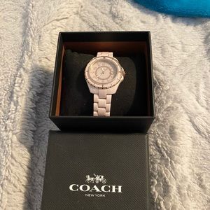 New never worn pale pink coach watch